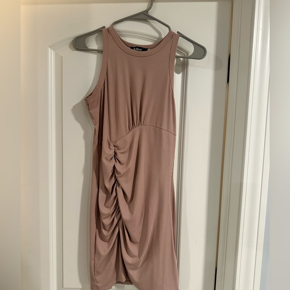 Beige sleeveless ruched mini dress